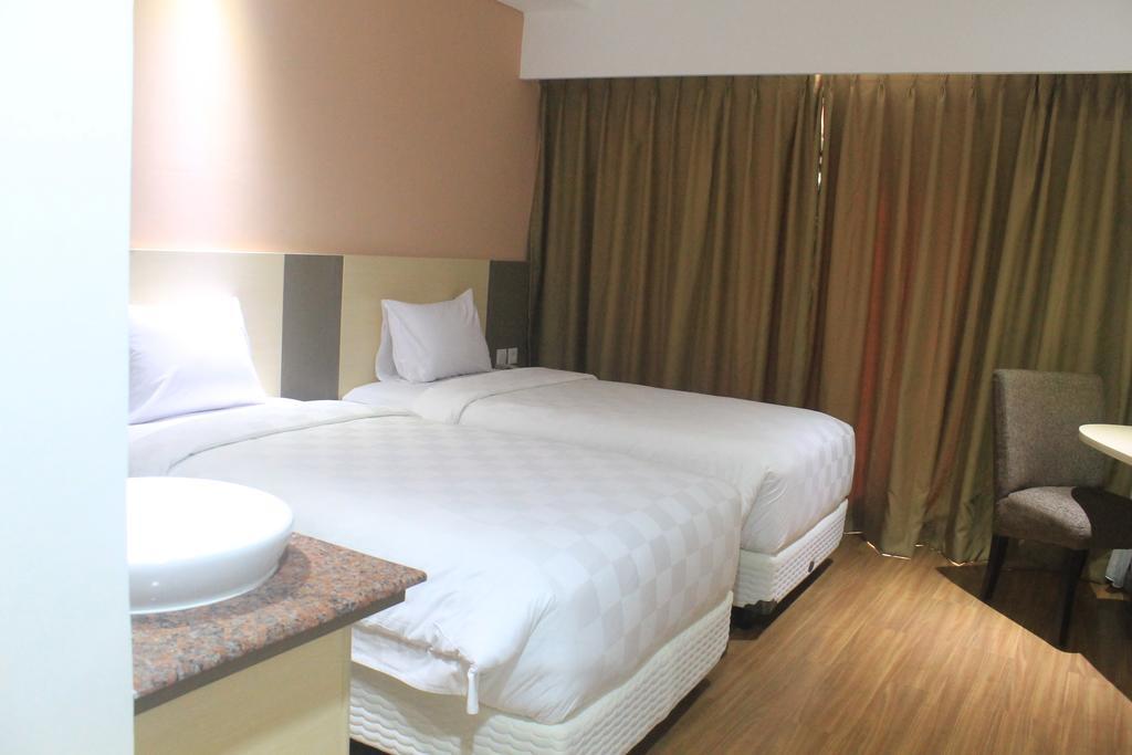 Dalton Hotel Makassar Chambre photo